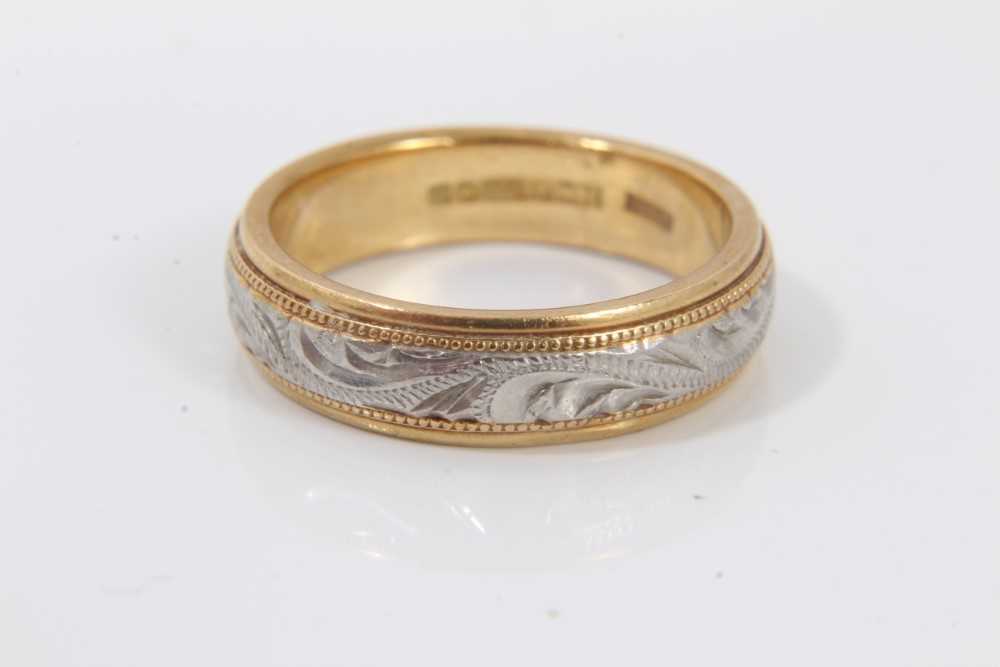 Lot 207 - 18ct yellow and white gold wedding ring