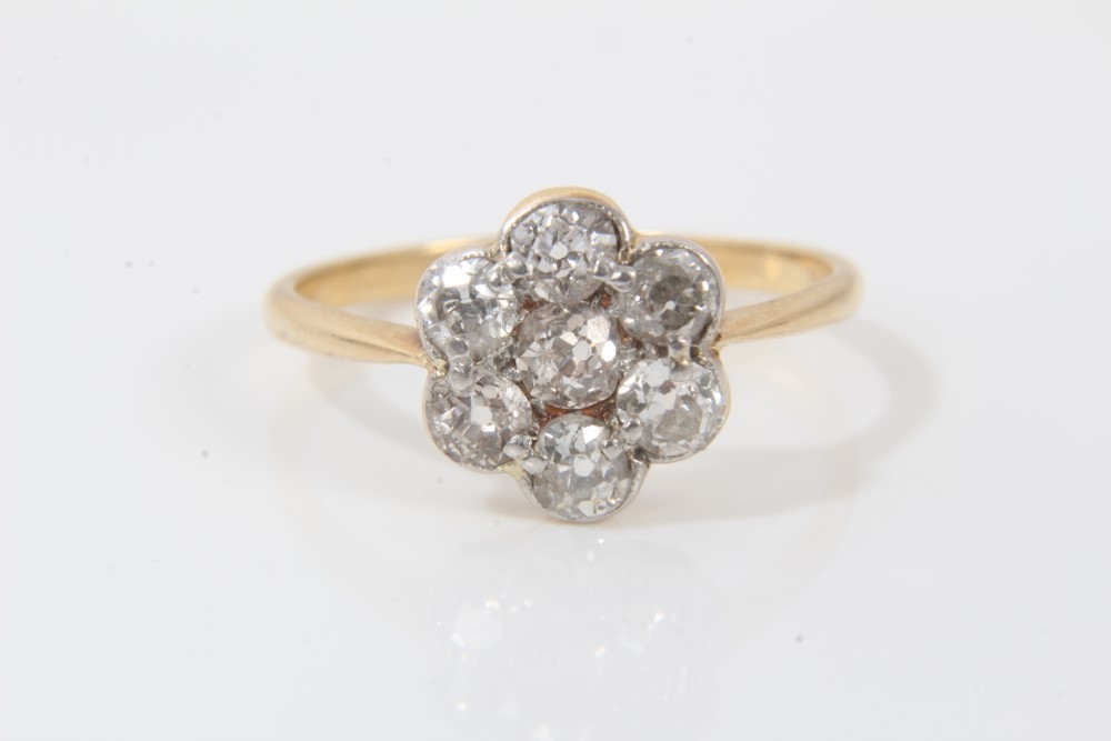 Lot 208 18ct gold diamond flower head cluster ring