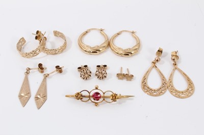 Lot 210 - Six pairs gold earrings and yellow metal gem set brooch
