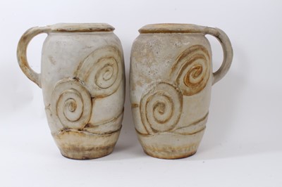Lot 1225 - Large pair of Bourne Denby pottery jugs, with coiled circle pattern in relief, 36.5cm high