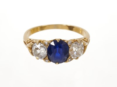 Lot 595 - Late Victorian diamond and sapphire three stone ring