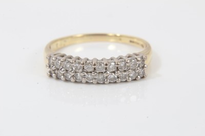 Lot 240 - 18ct gold diamond double row half eternity ring