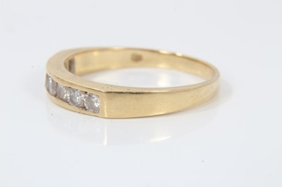 Lot 246 - 18ct gold diamond seven stone half eternity ring in channel setting