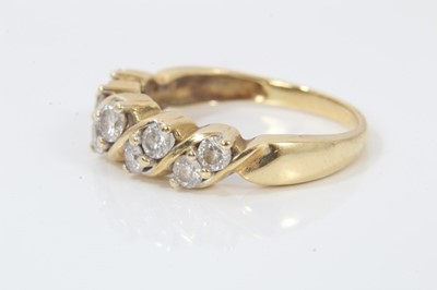 Lot 247 - 18ct gold diamond ten stone half eternity ring