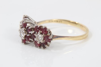 Lot 248 - 18ct gold ruby and diamond triple flower head cluster ring