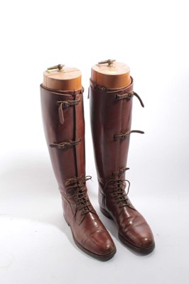 Lot 994 - Pair of First World World Officers' tan leather boots with wooden trees, named in ink 'Paul'