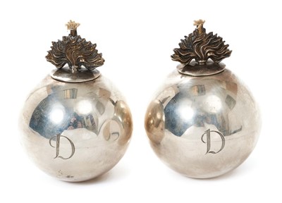 Lot 387 - Pair of silver table lighters, in the form of flaming grenades