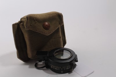 Lot 990 - Second World War compass dated 1940, together with a leather covered spotting scope (2)