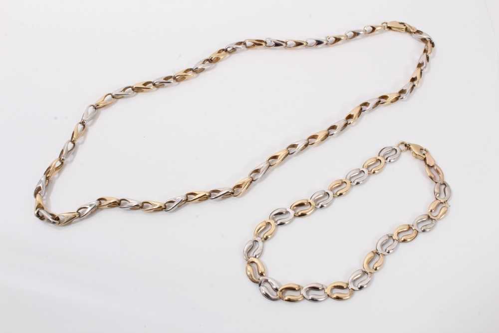 Lot 263 - 9ct white and yellow gold link chain and similar style bracelet