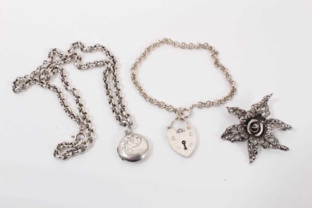 Lot 268 - Silver Belcher chain with round silver locket, silver bracelet with padlock clasp and silver marcasite flower brooch