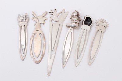 Lot 280 - Six silver novelty bookmarks each mounted with a bear, owl, fairy, sunshine, dove and horse with horseshoe