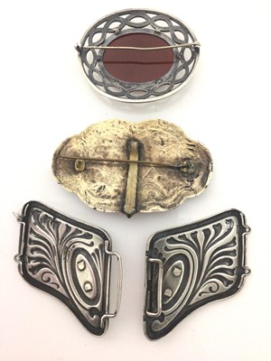 Lot 76 - Silver and agate brooch with pierced Celtic-style design, together with a silver-plated art nouveau buckle and an Eastern filigree and enamel brooch (3)