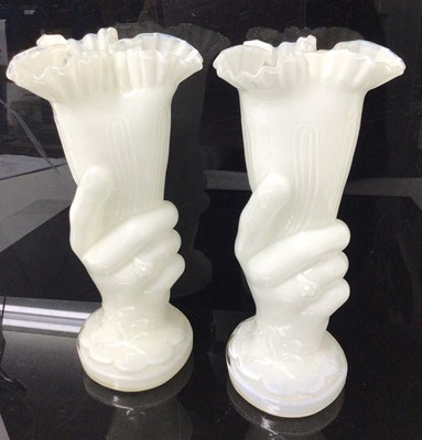 Lot 103 - Pair of Victorian opaque glass vases, in the form of a hand holding a flower, 21.5cm high