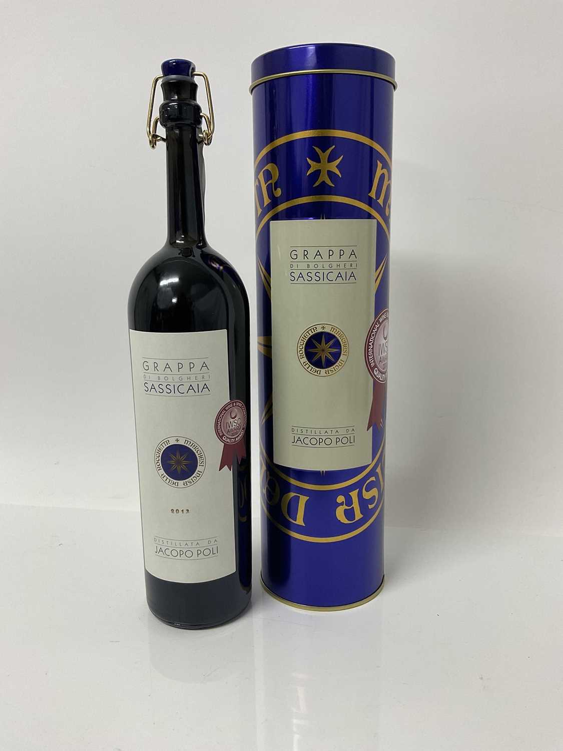 Lot 18 - Grappa - one bottle, Di Bolgheri Sassicaia 2013, Jacopo Poli, in original tin case