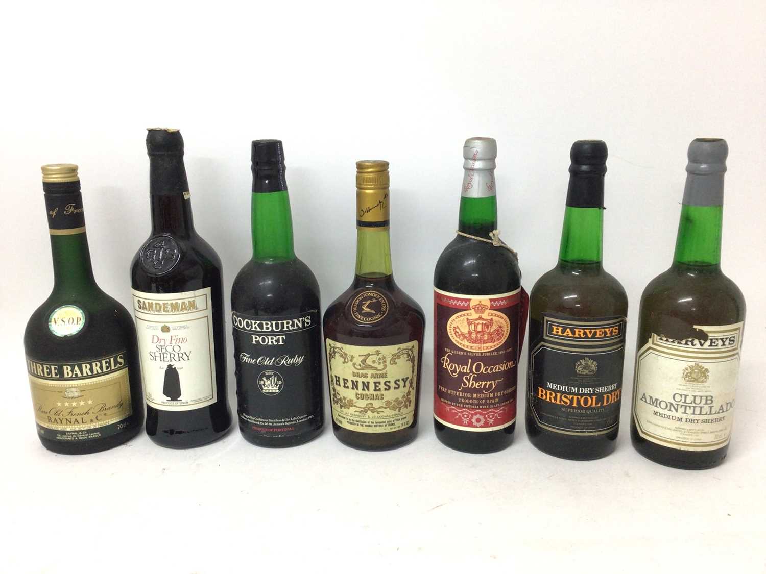 Lot 21 - Seventeen assorted bottles to include: Royal Occasion Sherry, Silver Jubilee, Cognac, Port, Gin and others