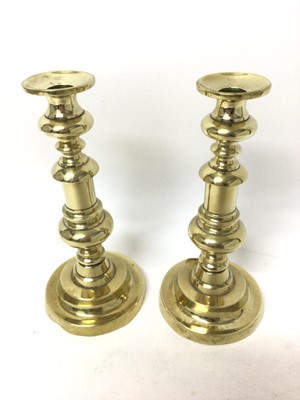 Lot 132 - Good quality pair of 19th century brass candlesticks, 26cm high