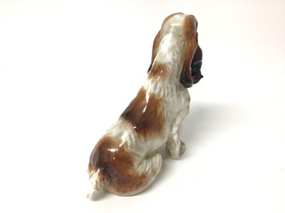 Lot 121 - Royal Doulton figure of a spaniel with a pheasant in its mouth, 13.5cm high