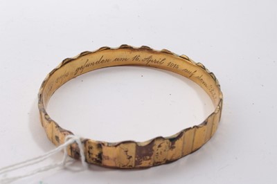 Lot 995 - Unusual First World War Trench Art gilt brass bangle, formed from the ring on a shell and engraved on the interior in German, the translation of which reads ''From the War 1914/15 found on 16th Apr...