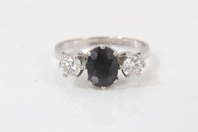 Lot 627 - Sapphire and diamond three stone ring