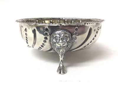 Lot 139 - Victorian silver sugar bowl of circular form with embossed beaded and reeded decoration on three hoof feet, (London 1884), 11cm diameter, 4.6ozs