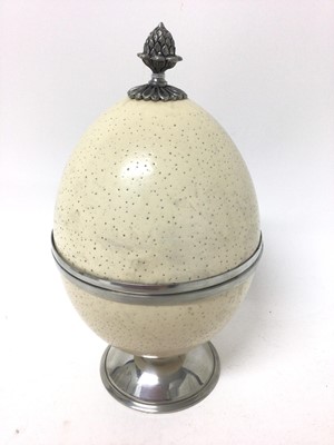 Lot 148 - Modern Continental pewter mounted ostrich egg urn and cover, 22cm high