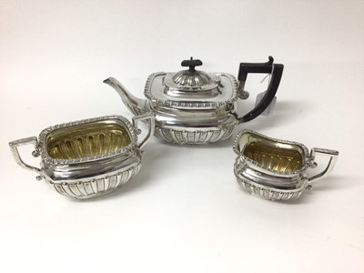 Lot 197 - Georgian-style silver three piece tea set