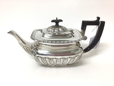 Lot 197 - Georgian-style silver three piece tea set