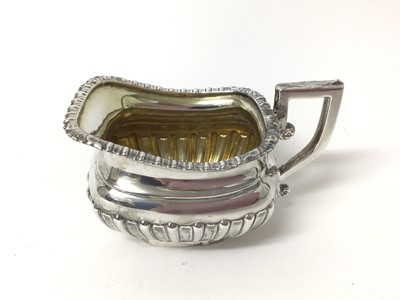 Lot 197 - Georgian-style silver three piece tea set