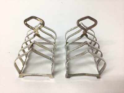 Lot 199 - Pair silver toast racks of arched form ( Birmingham1964)