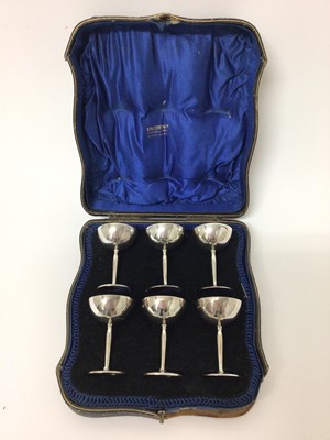 Lot 200 - Set six unusual Chinese market silver cups in case
