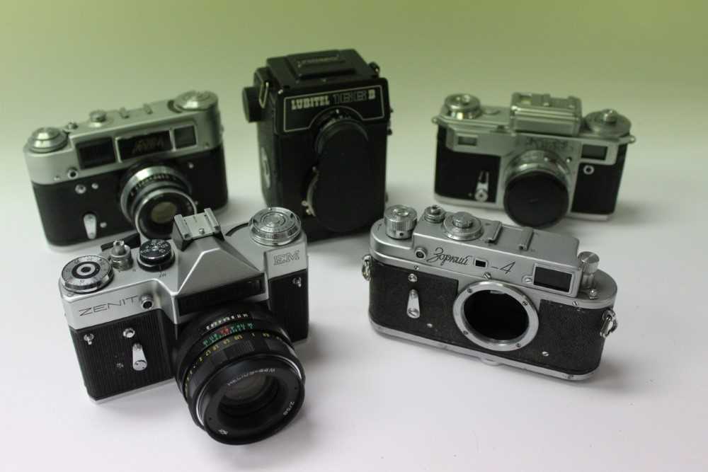 Lot 2697 - Quantity of vintage Russian/Soviet cameras, lenses and accessories, including Fed, Zenit and Lubitel