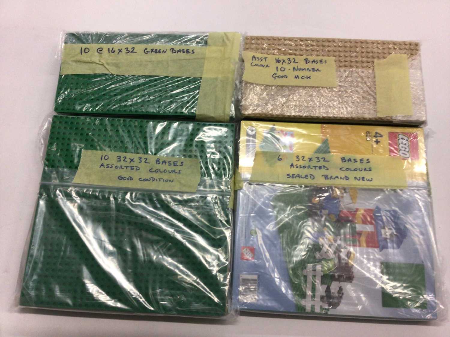Lot 1767 - Lego 6092 pd 03 32 x32 raised grey pool, 3947 bp x1 raised crater, assorted road bases (10), assorted road and island bases three with Center studs missing (10), 32 x 32 assorted colour bases (16)...