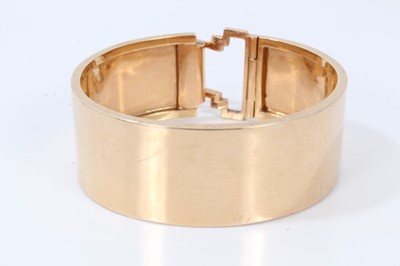 Lot 396 - Art Deco 14ct rose gold bangle with hinged buckle clasp