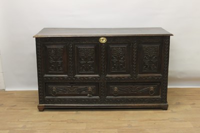 Lot 1270 - 18th century carved oak mule chest