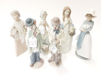 Lot 1248 - Three Lladro figures together with two NAO figures and other (6)