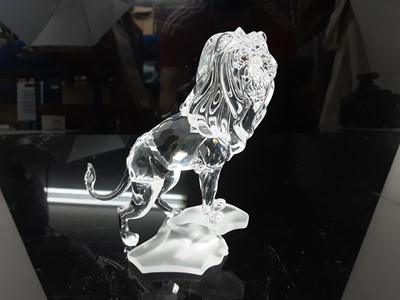 Lot 1251 - Swarovski crystal model - Lion standing on a rock