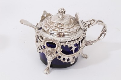 Lot 367 - Silver mustard pot and matching silver salt, both with blue glass liners, silver pepperette and silver condiment spoons