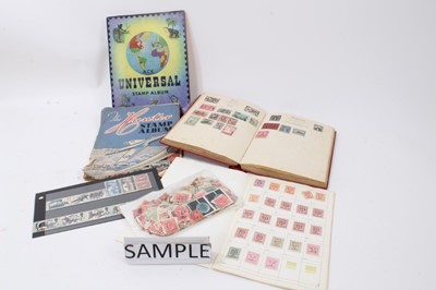 Lot 1586 - Two boxes of stamp albums and loose world stamps