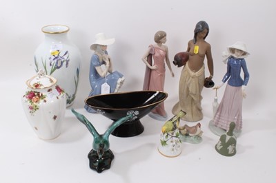 Lot 1262 - Lladro figure - lady carrying vessels, three Nao figures and decorative china