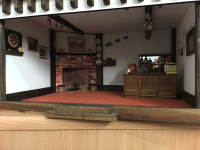 Lot 1847 - Good quality doll's house Pub, by Robert Stubbs, with electric light fitting and fitted with furniture