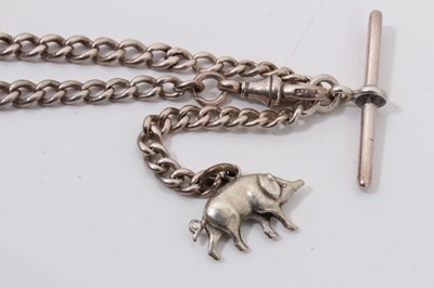 Lot 325 - Two silver watch chains, one with a pig charm