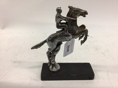 Lot 2046 - Chromium plated Desmo car mascot in the form of a jockey on horse back, 15cm in height (excluding base)