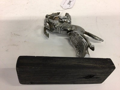 Lot 2046 - Chromium plated Desmo car mascot in the form of a jockey on horse back, 15cm in height (excluding base)