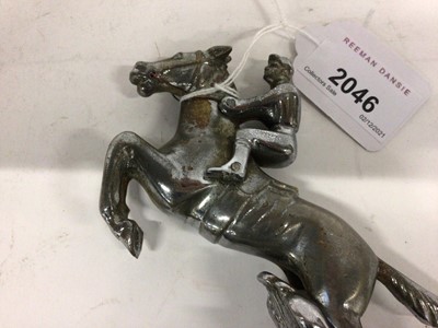 Lot 2046 - Chromium plated Desmo car mascot in the form of a jockey on horse back, 15cm in height (excluding base)