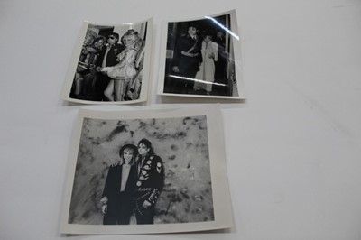 Lot 1599 - Michael Jackson Twelve 1980's Black and White Press Release photographs.  Michael Jackson with various stars including Liz Taylor, Diana Ross 1981,Whitney Houston, Brooke