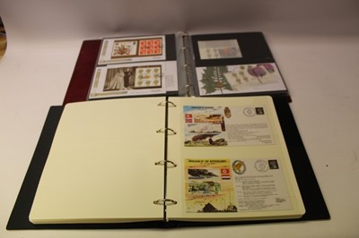 Lot 1365 - World mixed stamp, coin and banknote covers to include the Royal Mail First Day Covers and World Warr II etc, in four presentation albums (qty)