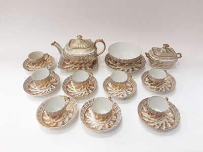 Lot 1291 - 19th century English porcelain tea service with greek key borders comprising teapot and stand, slops bowl and stand, sucrier, eight cups and eight saucers (21 pieces)