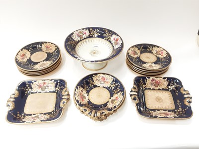 Lot 1293 - 19th century English porcelain desert service (probably by Coalport) with blue, gilt and floral decoration comprising comport, three scalloped dishes, two square dishes and ten plated (16 pieces)