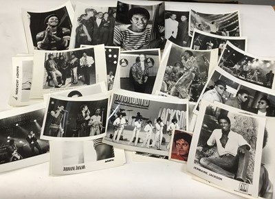 Lot 1606 - Michael Jackson and The Jacksons Thirty 1980's Black and White photographs including Press Release, Ebert Roberts, Epic Arista etc.