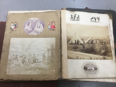 Lot 1608 - Four 19th century albums of crests, armorials and ephemera